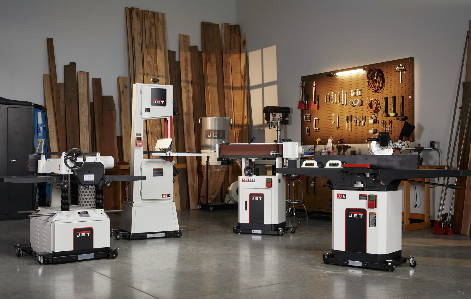 Industrial woodworking machines arranged in a professional workshop
